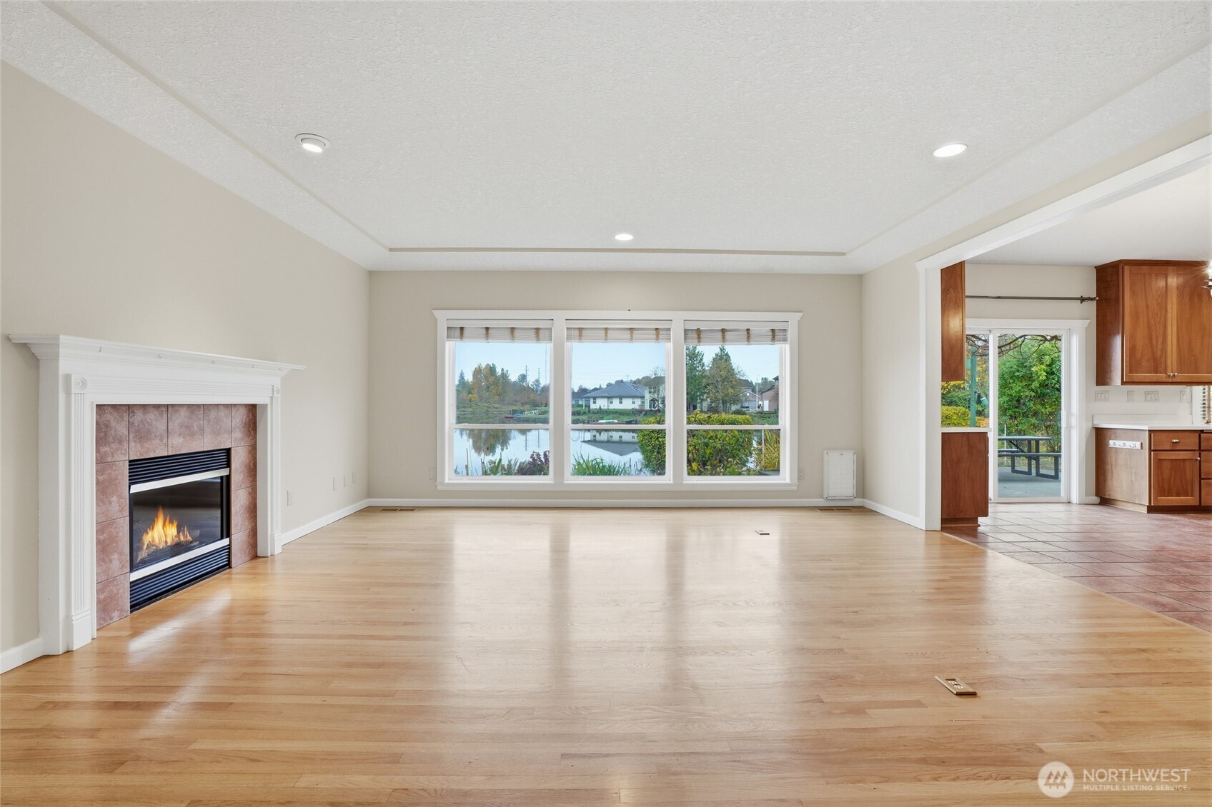 3550 Northeast 214th Avenue Fairview, OR 97024 - Photo 10 of 40 a view of an empty room with wooden floor and a window