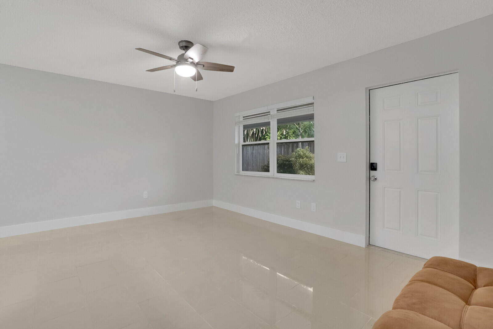 914 North Federal Highway, Unit 4 Lake Worth Beach, FL 33460 - Photo 3 of 18 wooden floor in an empty room with a window