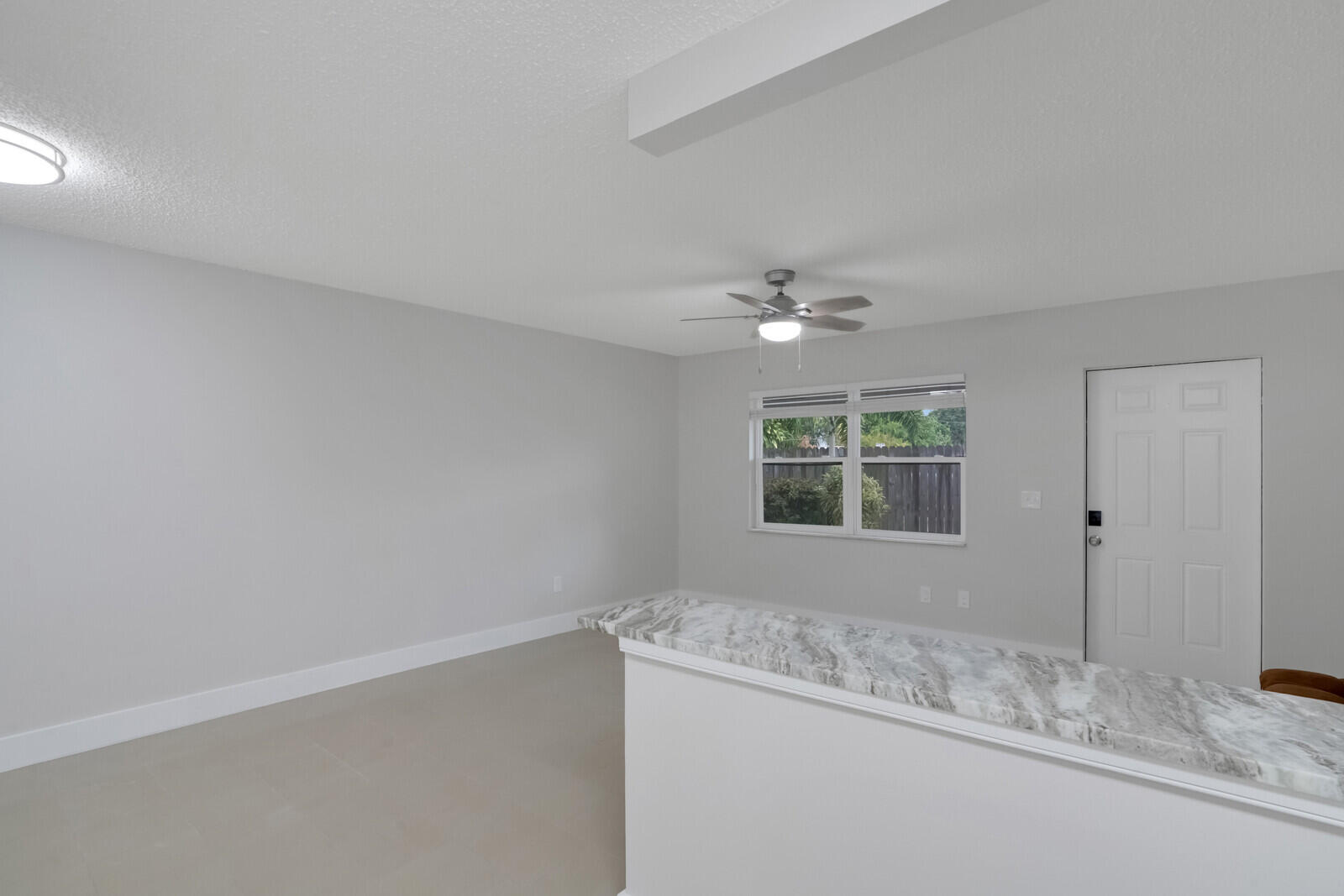 914 North Federal Highway, Unit 4 Lake Worth Beach, FL 33460 - Photo 9 of 18 an empty room with a window