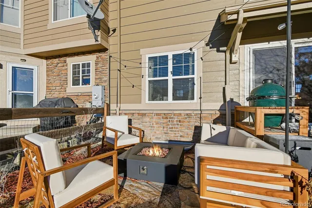 front view of a building with a sitting area