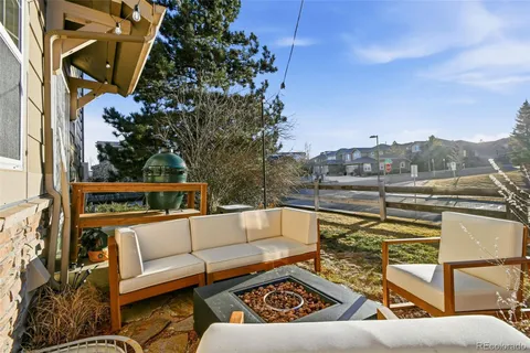 a view of a house with large trees