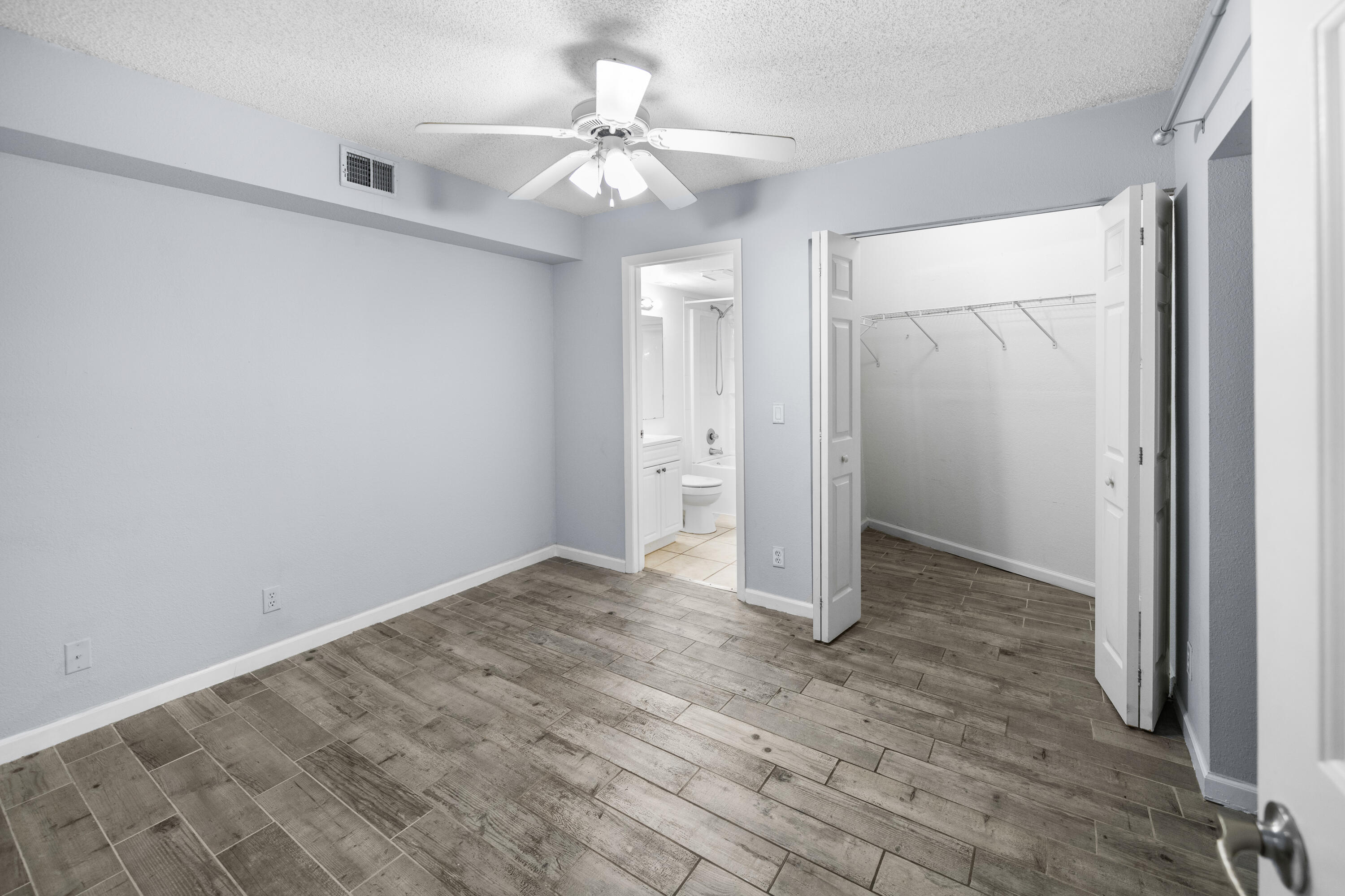 8237 Severn Drive, Unit A Boca Raton, FL 33433 - Photo 11 of 19 an empty room with a bathroom