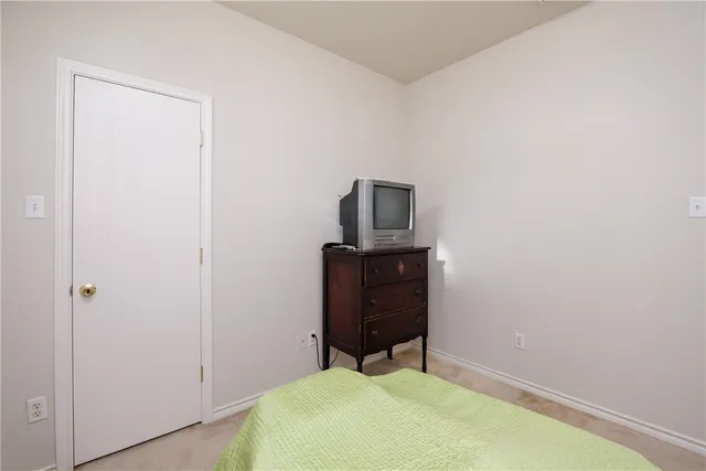 a room that has a bed and a chair