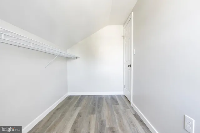 a view of a room with racks on the wall