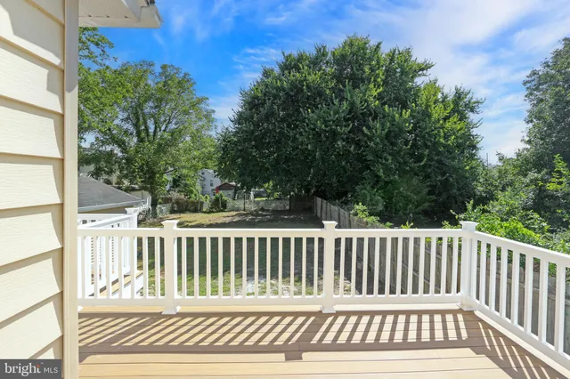 a view of a balcony with city view