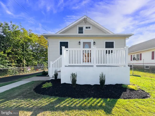 a view of a backyard with tree s