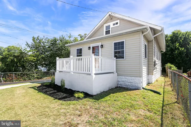 a view of a house with swimming pool
