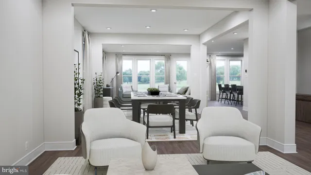 a living room with furniture a window and a dining table