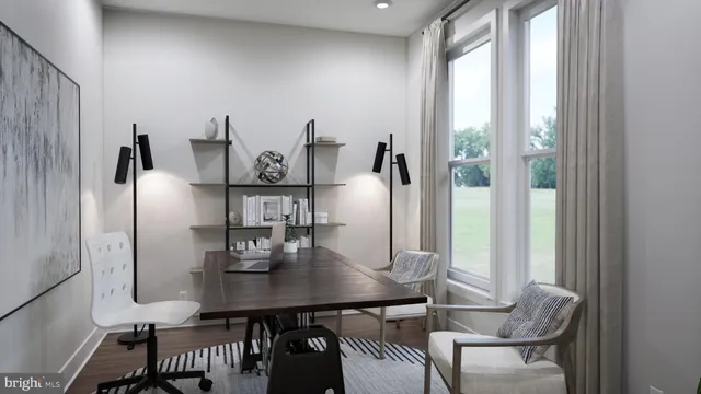 a view of a dining room with furniture and window