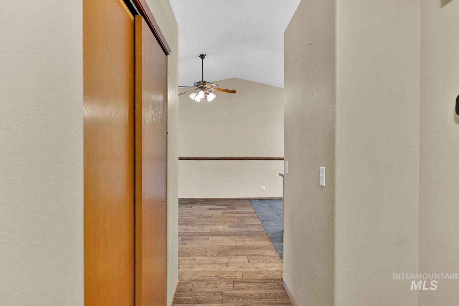 8561 Nebraska Street Rathdrum, ID 83858 - Photo 14 of 50 Hallway featuring lofted ceiling and light wood-style flooring