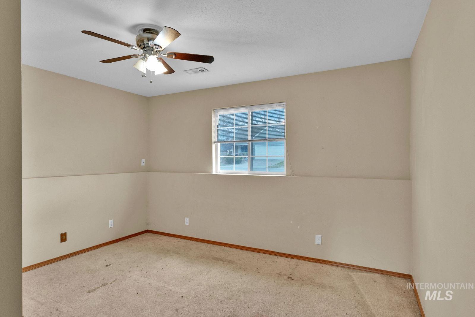 8561 Nebraska Street Rathdrum, ID 83858 - Photo 34 of 50 Empty room featuring a ceiling fan and carpet floors