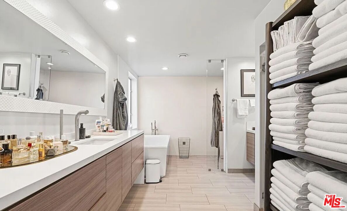 615 6th Avenue, Unit 1/2 Venice, CA 90291 - Photo 12 of 44 a bathroom with a double vanity sink and a mirror