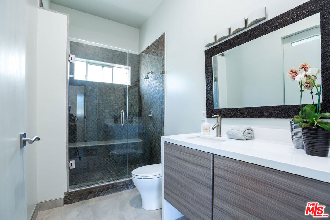 615 6th Avenue, Unit 1/2 Venice, CA 90291 - Photo 17 of 44 a bathroom with a sink a toilet and shower