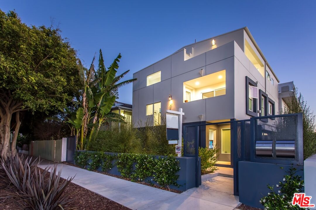 615 6th Avenue, Unit 1/2 Venice, CA 90291 - Photo 2 of 44 a front view of a house with a yard