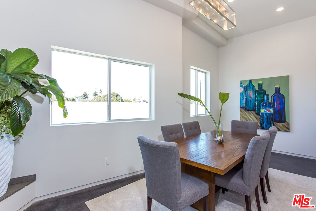 615 6th Avenue, Unit 1/2 Venice, CA 90291 - Photo 22 of 44 a view of a dining room with furniture window and wooden floor