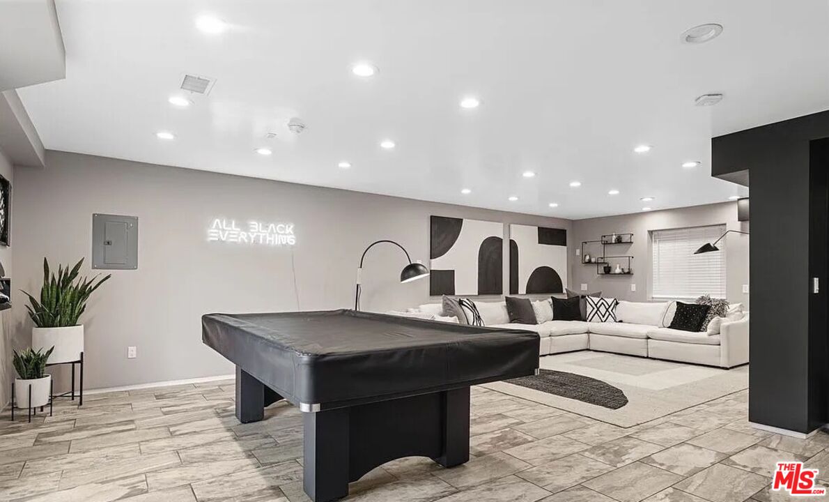 615 6th Avenue, Unit 1/2 Venice, CA 90291 - Photo 25 of 44 a living room with furniture and a potted plant