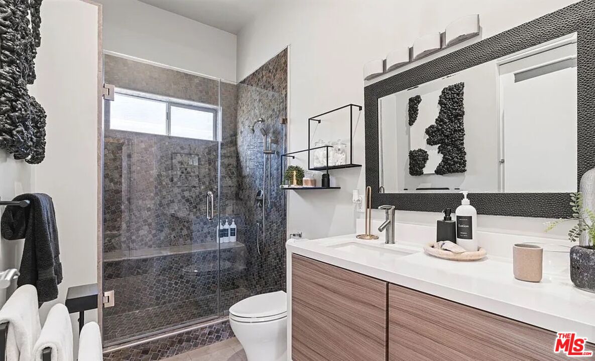 615 6th Avenue, Unit 1/2 Venice, CA 90291 - Photo 35 of 44 a bathroom with a sink a toilet and shower