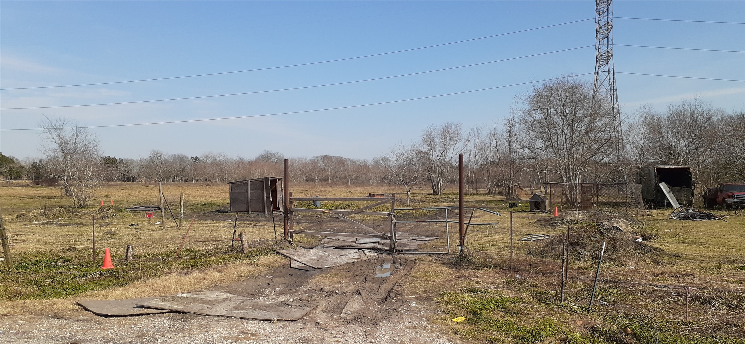 0 County Road 383 Rosharon, TX 77583 - Photo 2 of 4 a view of a dry yard with wooden fence
