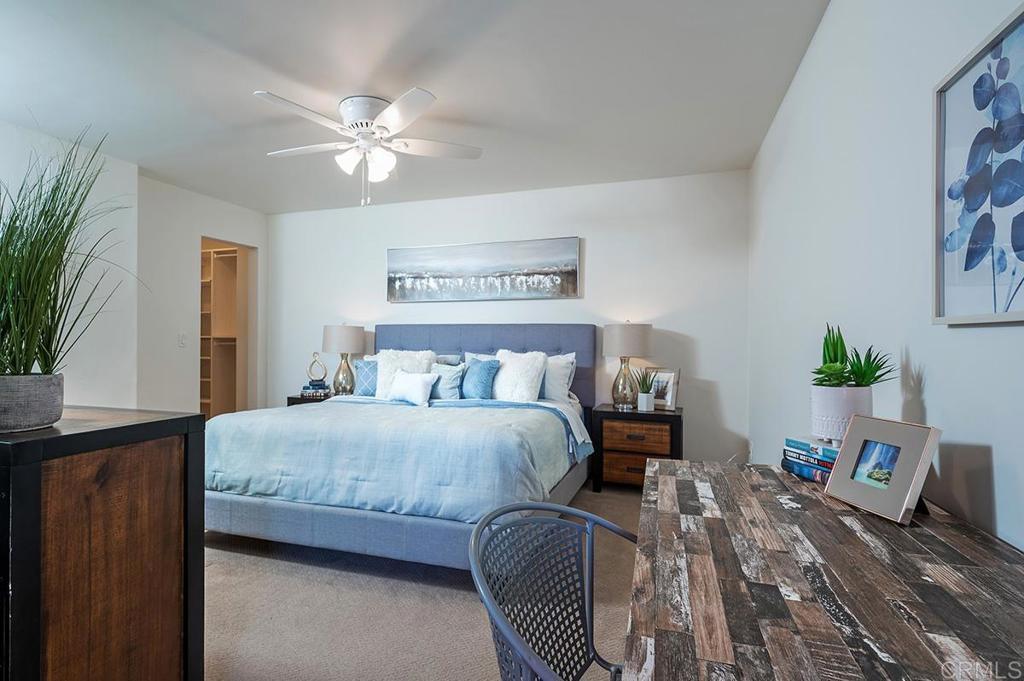 3688 1st Avenue, Unit 15 San Diego, CA 92103 - Photo 18 of 35 a bedroom with a bed and a potted plant