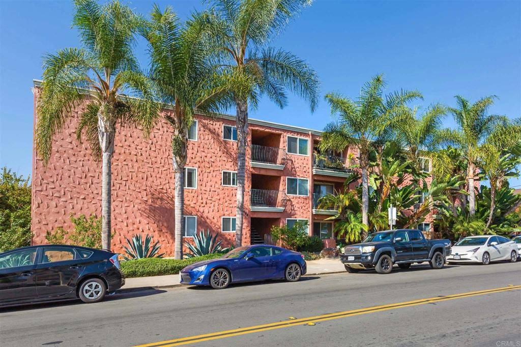 3688 1st Avenue, Unit 15 San Diego, CA 92103 - Photo 33 of 35 a car parked in front of a building