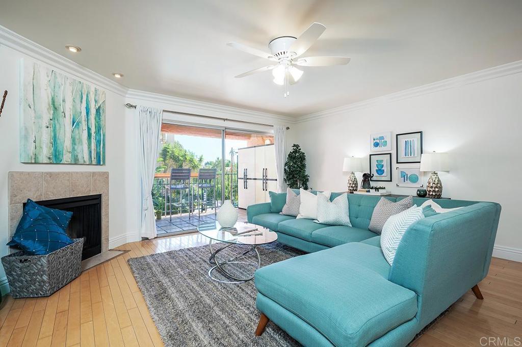 3688 1st Avenue, Unit 15 San Diego, CA 92103 - Photo 9 of 35 a living room with furniture and a fireplace