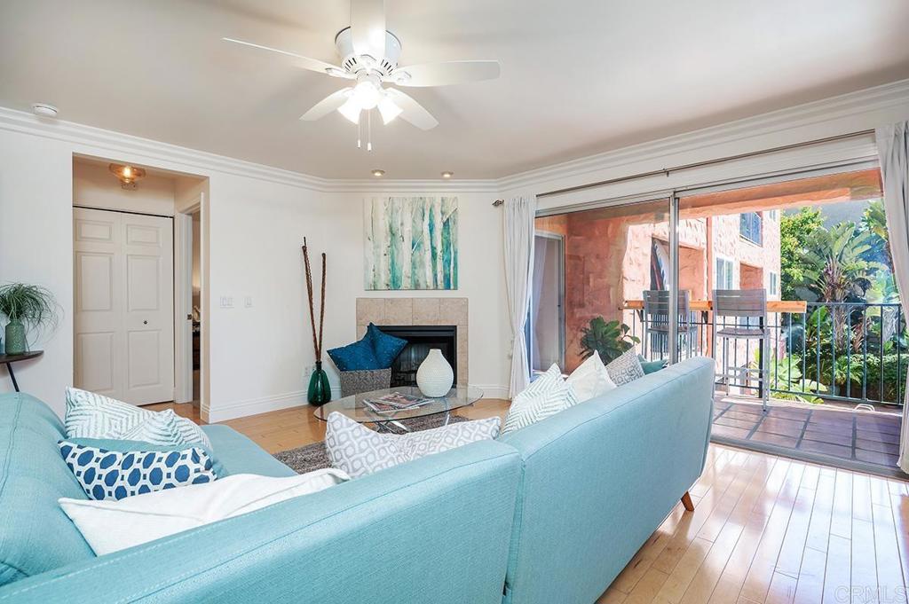 3688 1st Avenue, Unit 15 San Diego, CA 92103 - Photo 10 of 35 a living room with furniture and a large window