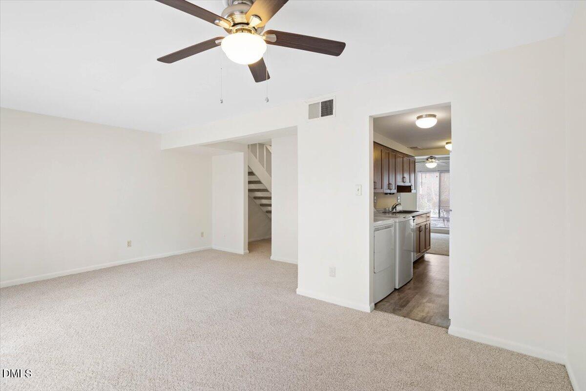 1748 Quail Ridge Road Raleigh, NC 27609 - Photo 16 of 36 an empty room with closet and a ceiling fan