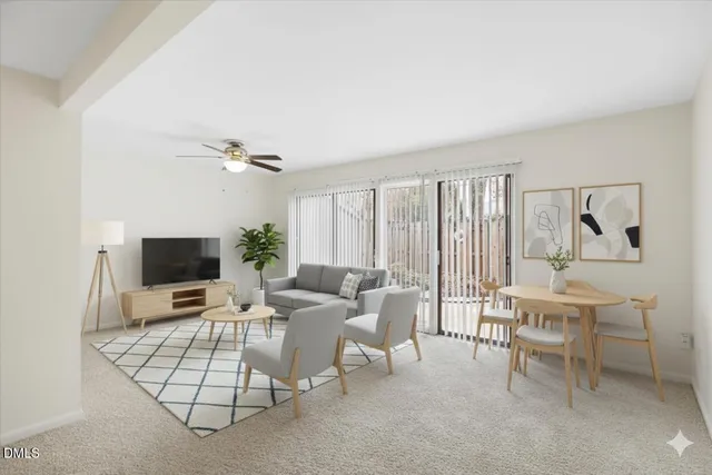 an empty room with a ceiling fan