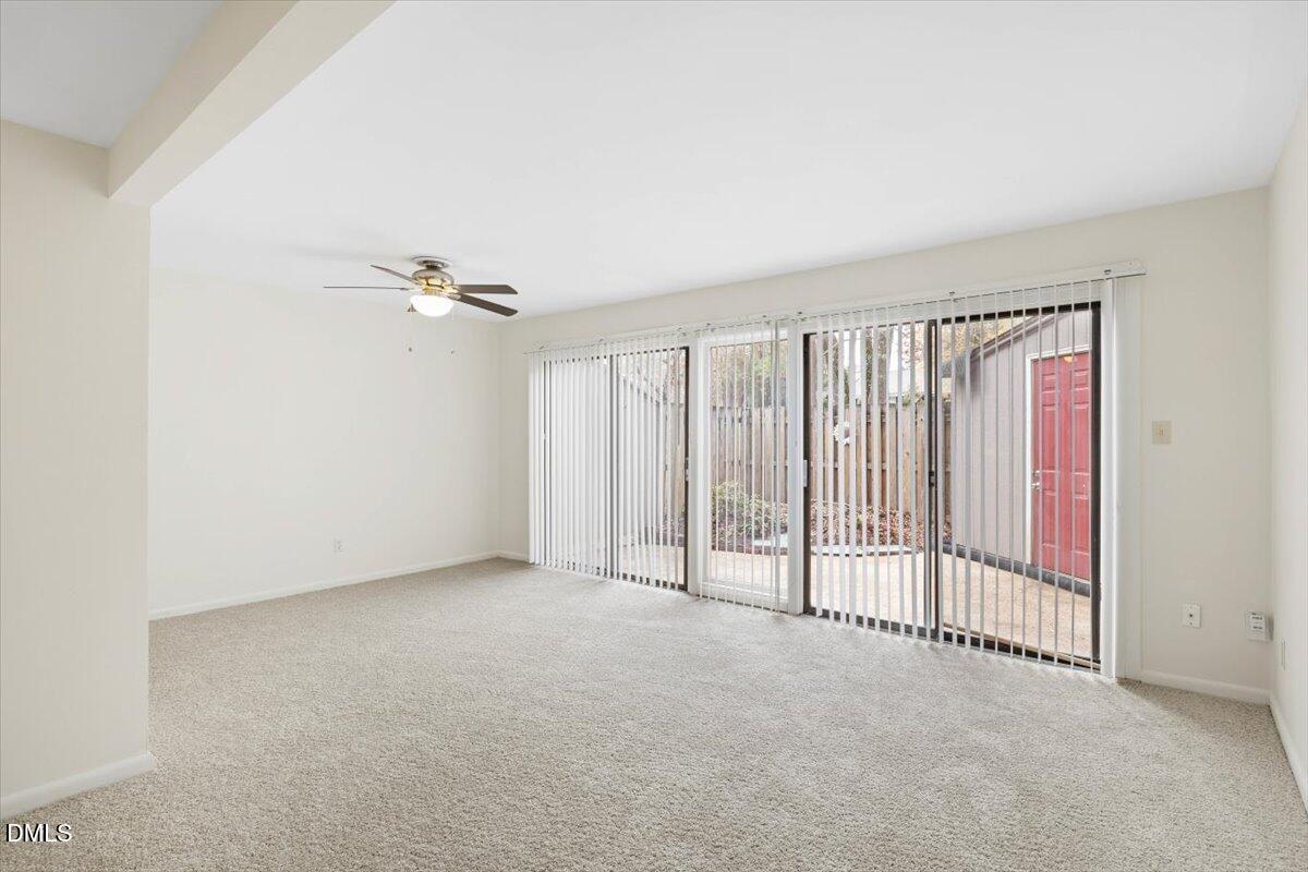 1748 Quail Ridge Road Raleigh, NC 27609 - Photo 20 of 36 a view of an empty room with a window