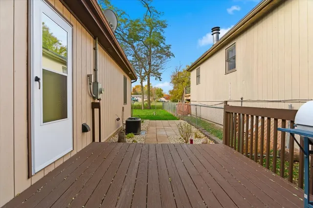 a view of balcony with wooden floor