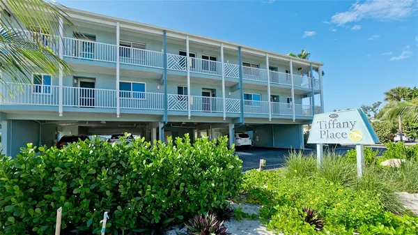 a front view of a building with balcony