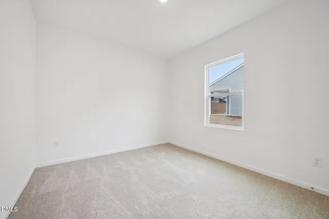 a black and white photo of a big room