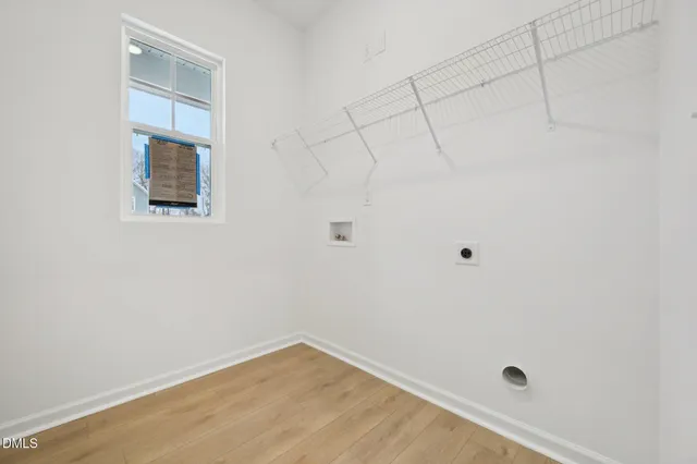 a kitchen with a sink a stove and refrigerator