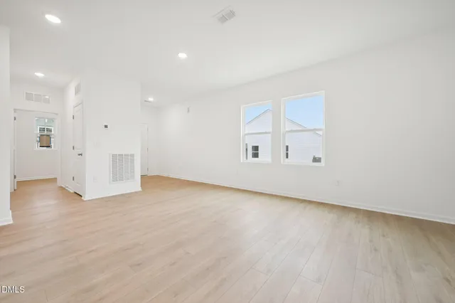 a kitchen with microwave cabinets and stove top oven