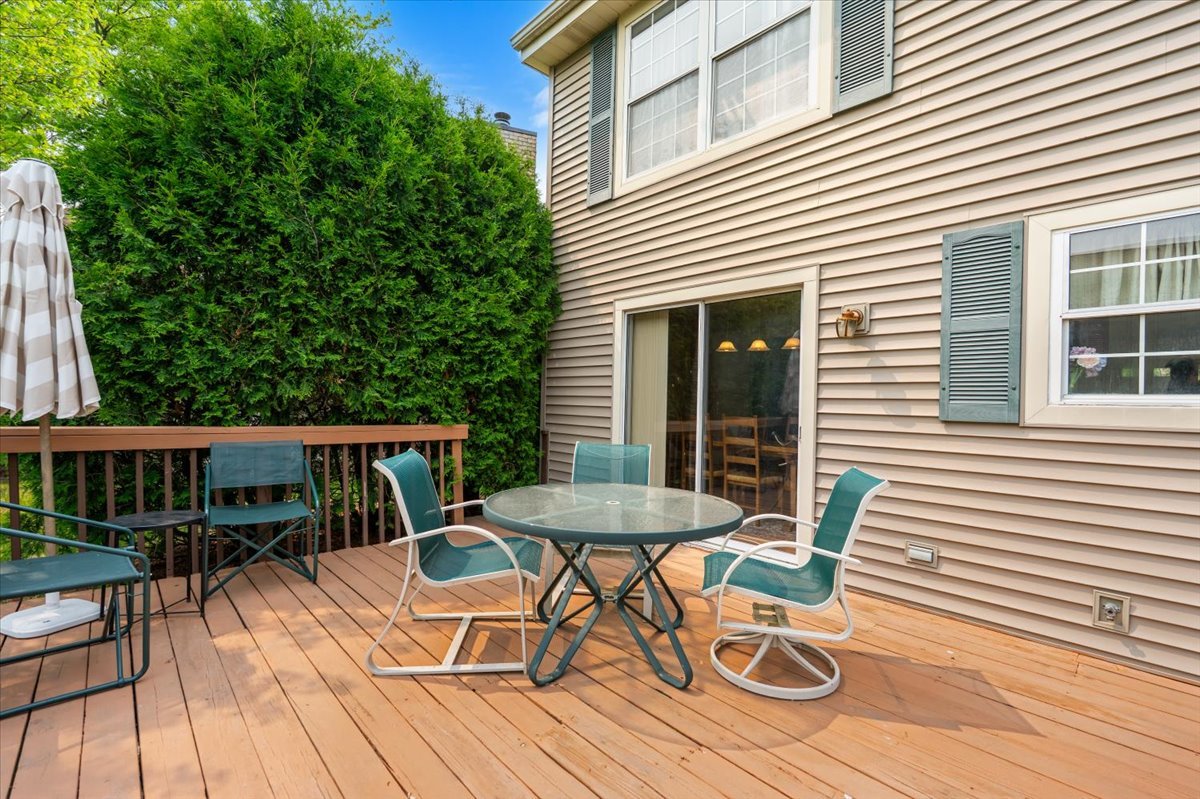 642 Dunham Road Gurnee, IL 60031 - Photo 19 of 33 a patio with table and chairs and potted plants
