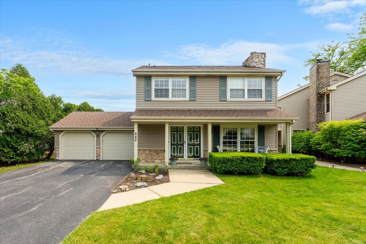 642 Dunham Road Gurnee, IL 60031 - Photo 21 of 33 a view of a house with backyard and plants