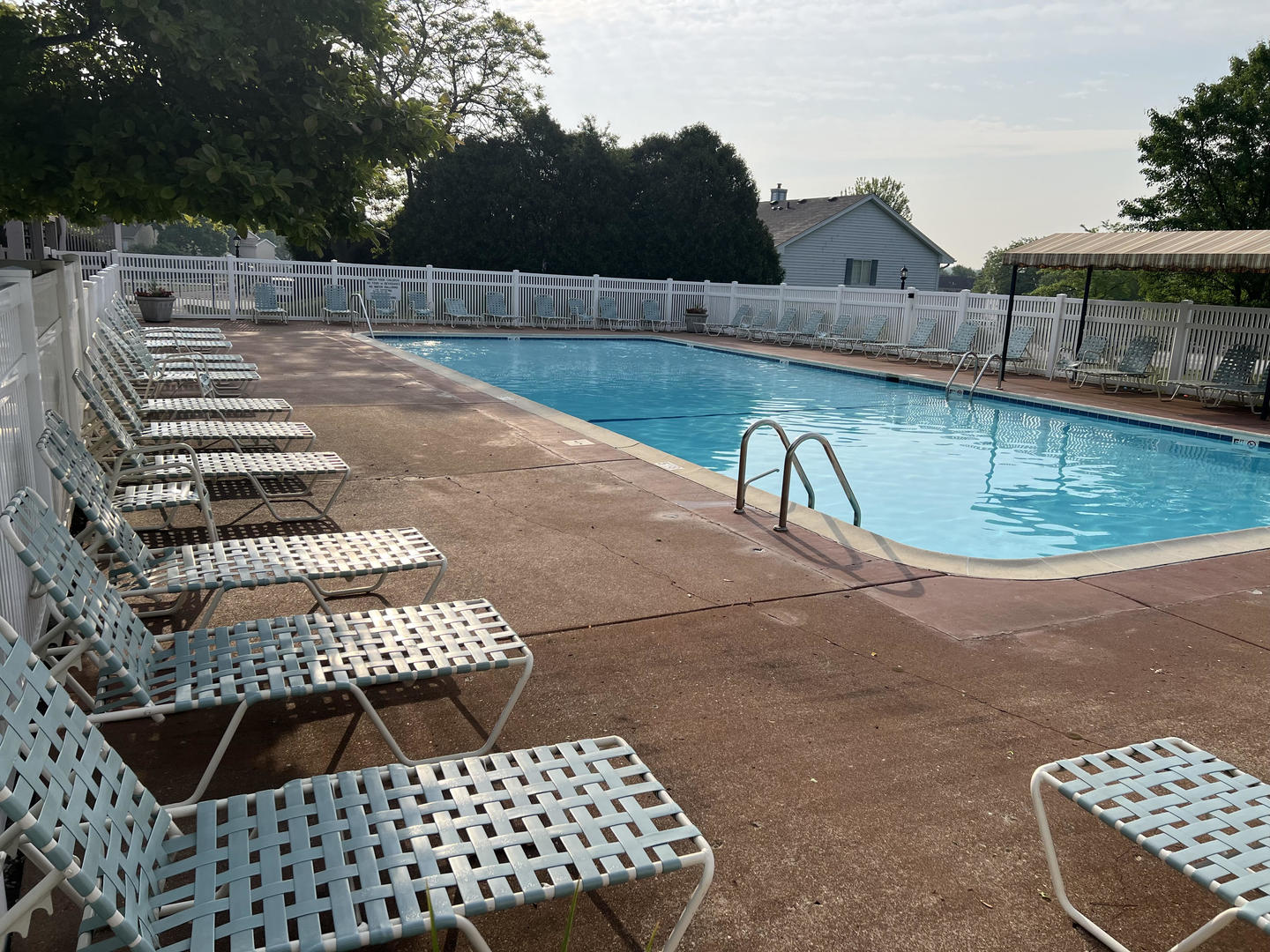 642 Dunham Road Gurnee, IL 60031 - Photo 30 of 33 a view of a swimming pool with a patio and a yard