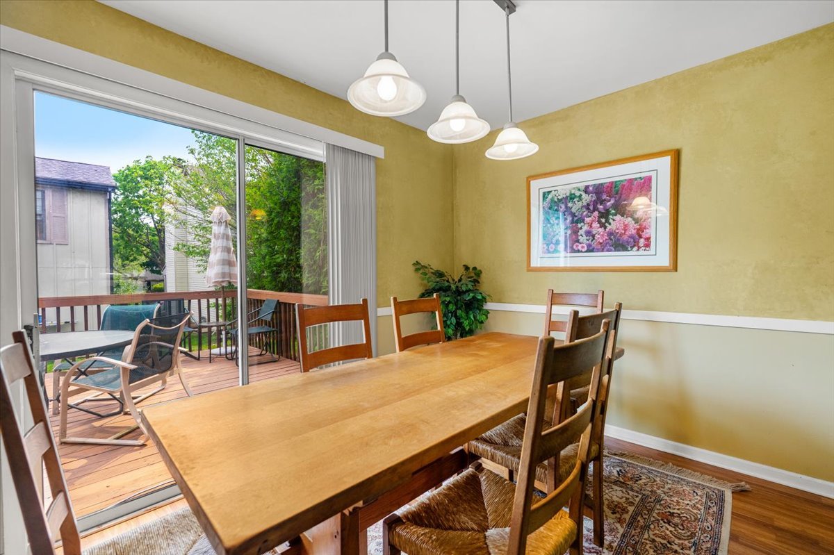 642 Dunham Road Gurnee, IL 60031 - Photo 8 of 33 a view of a dining room with furniture window and outside view