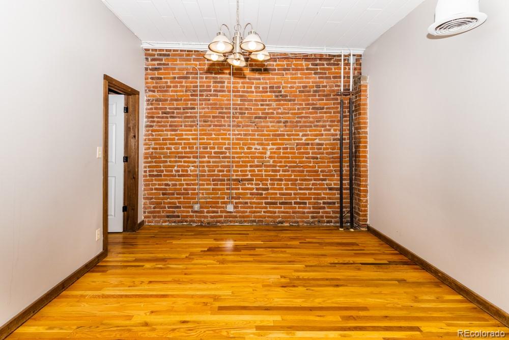 1940 Blake Street, Unit 301 Denver, CO 80202 - Photo 21 of 25 a bathroom with a shower