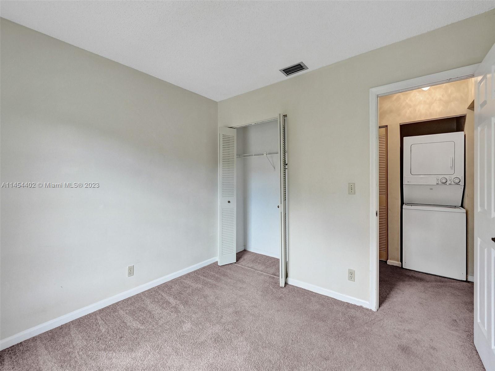 321 Olivewood Place, Unit O221 Boca Raton, FL 33431 - Photo 14 of 56 a view of an empty room