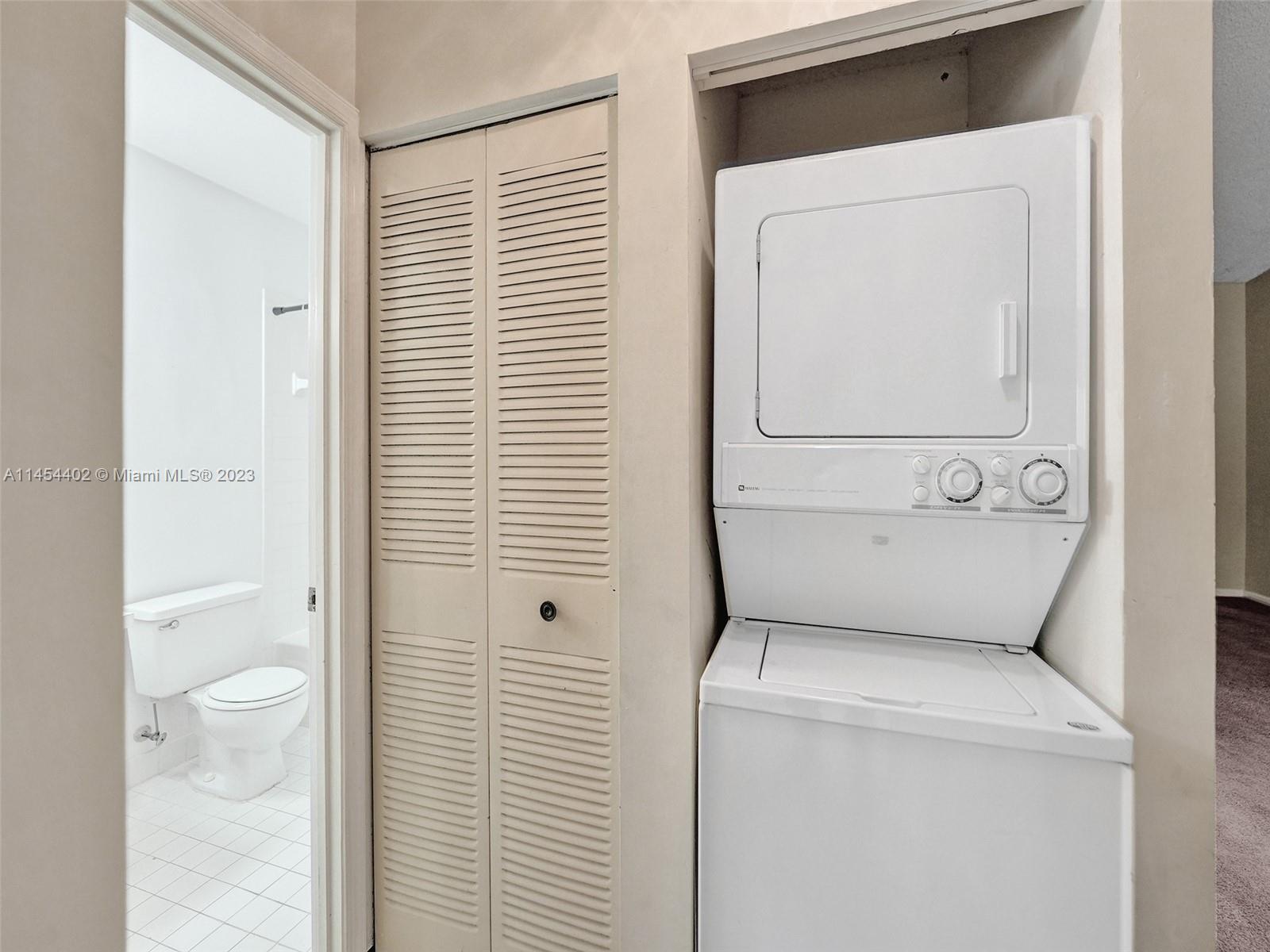321 Olivewood Place, Unit O221 Boca Raton, FL 33431 - Photo 32 of 56 a bathroom with a toilet and a sink