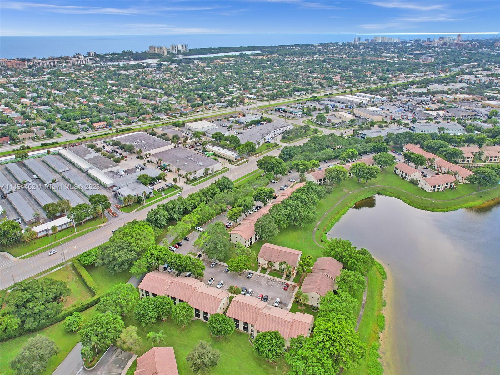 321 Olivewood Place, Unit O221 Boca Raton, FL 33431 - Photo 39 of 56 an aerial view of multiple house