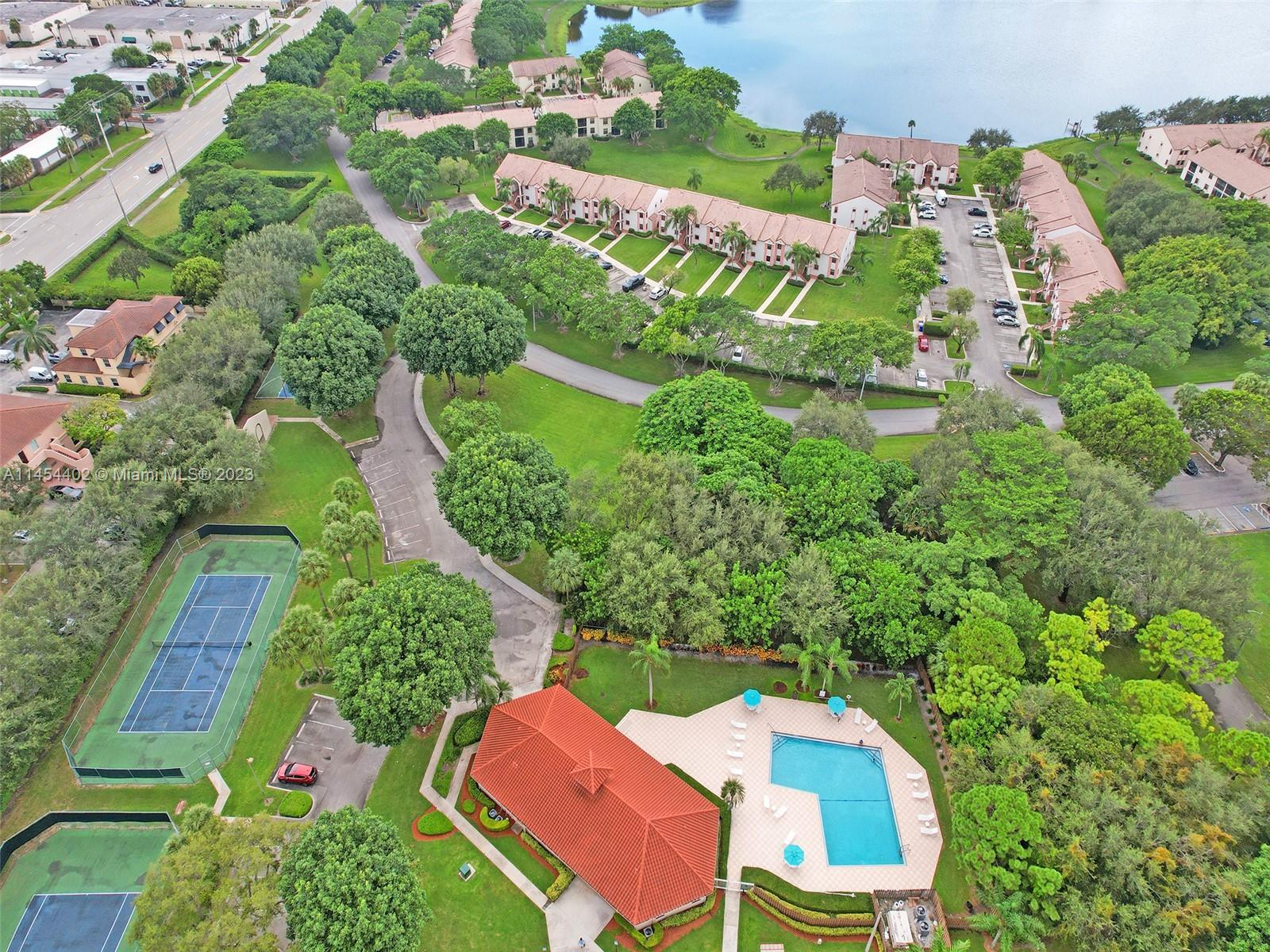 321 Olivewood Place, Unit O221 Boca Raton, FL 33431 - Photo 51 of 56 an aerial view of a house with yard swimming pool and outdoor seating