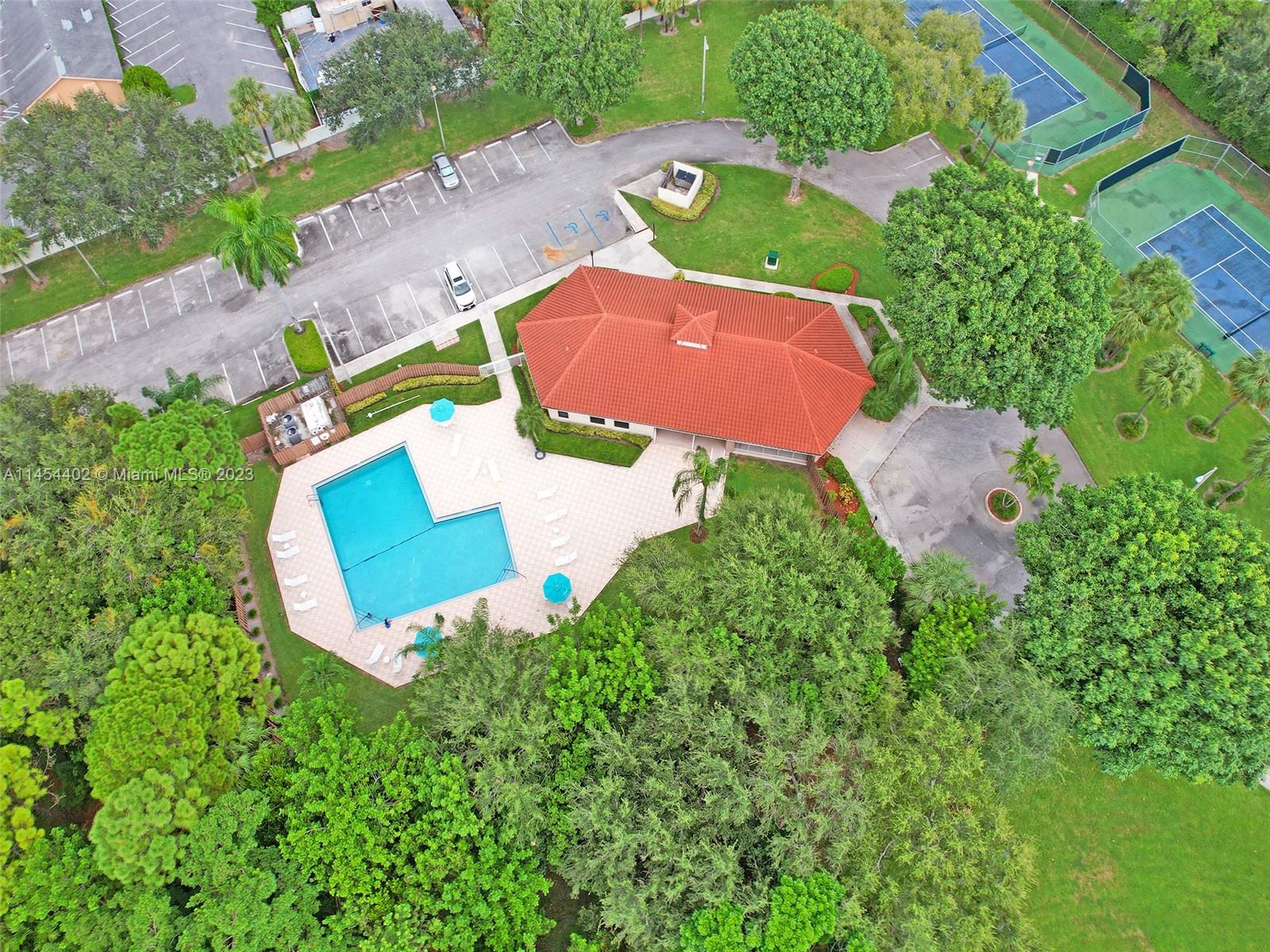 321 Olivewood Place, Unit O221 Boca Raton, FL 33431 - Photo 56 of 56 an aerial view of a house with yard swimming pool and outdoor seating
