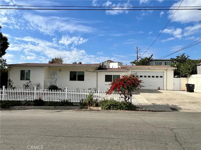 front view of a house with a garage