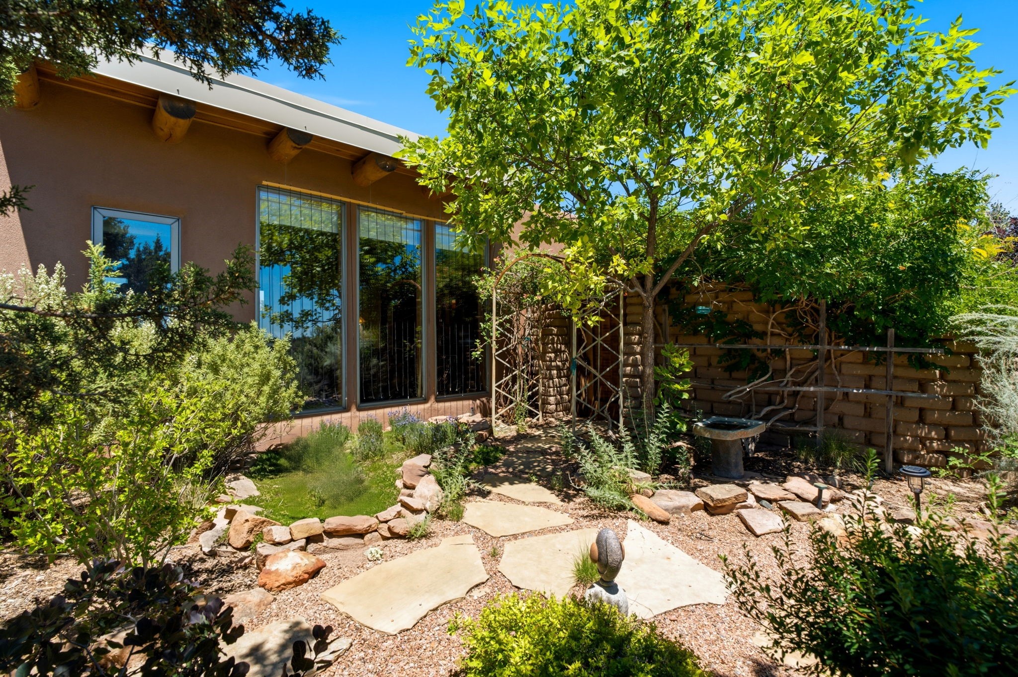 22 Mimosa Road Santa Fe, NM 87508 - Photo 33 of 51 Lush landscaping in backyard