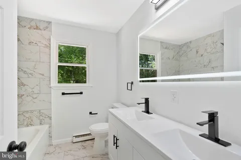 a bathroom with a bathtub