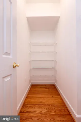 a view of a room with racks on the wall