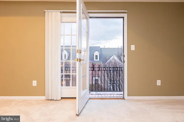 a view of a door and a window