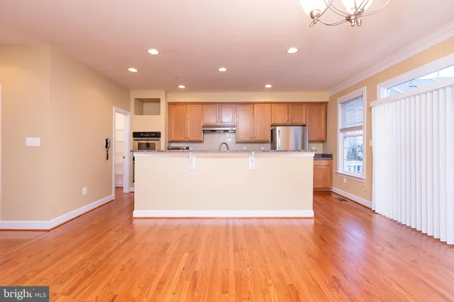 a view of kitchen with wooden floor